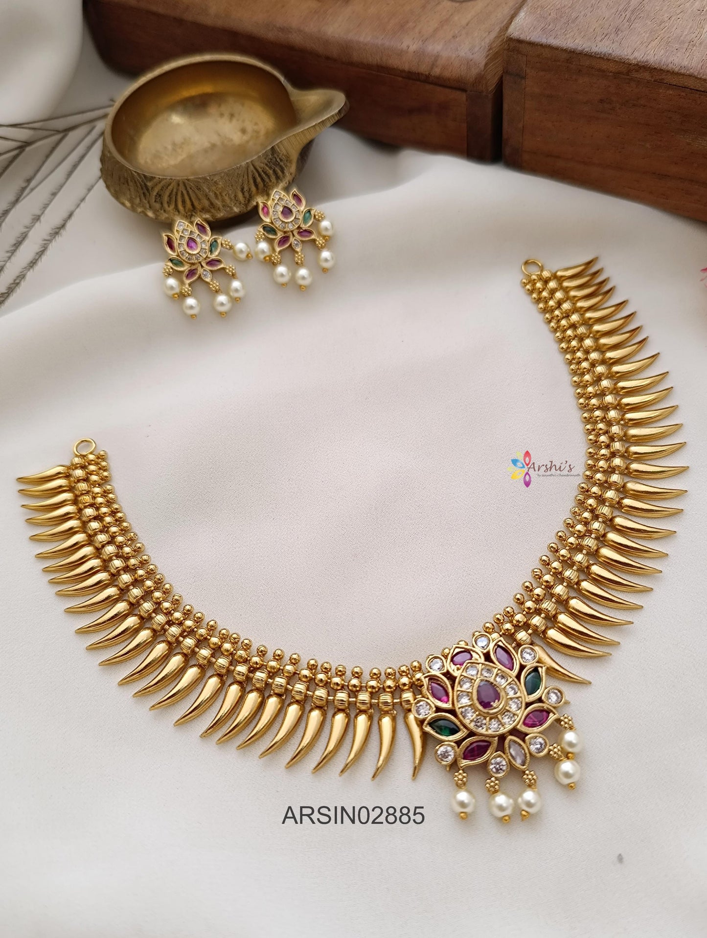 Spike Necklace with Lotus Pendant