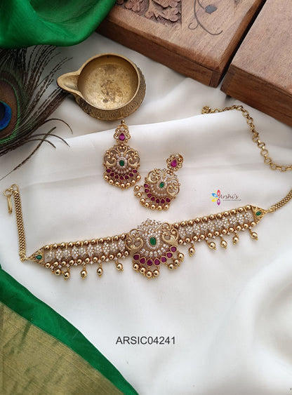 the earrings should be in center of the necklace