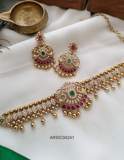 the earrings should be in center of the necklace