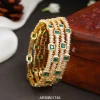 Emerald and White Stone Set of Four Bangles